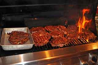 Meals- Ribeye Steaks Grilling for Dinner